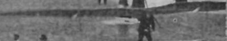 1908PhotoFlyTCFinHighARhangglider.JPG